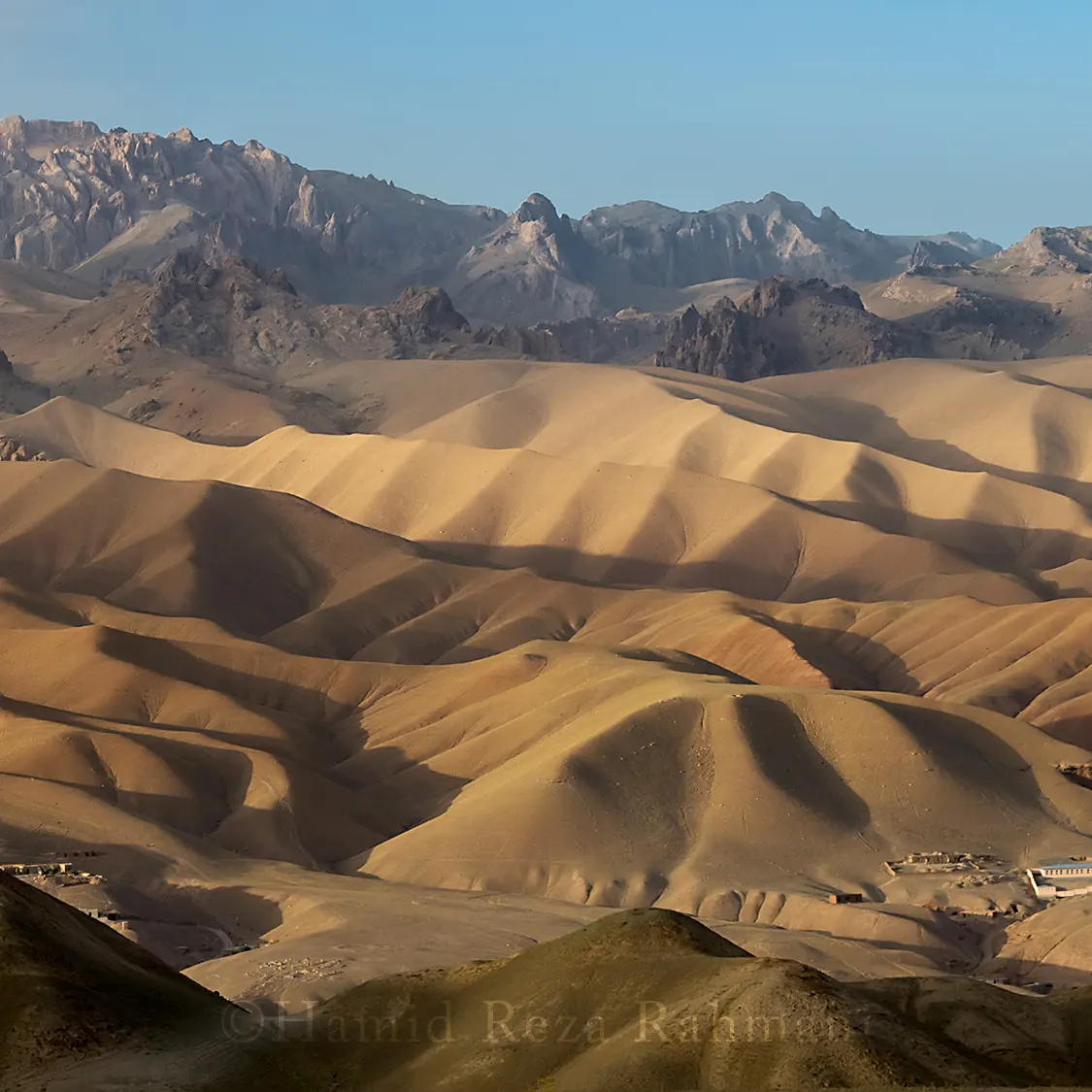 Folded ochre ridges of Dragon Valley (Darra-e Ajdahar) near Bamyan