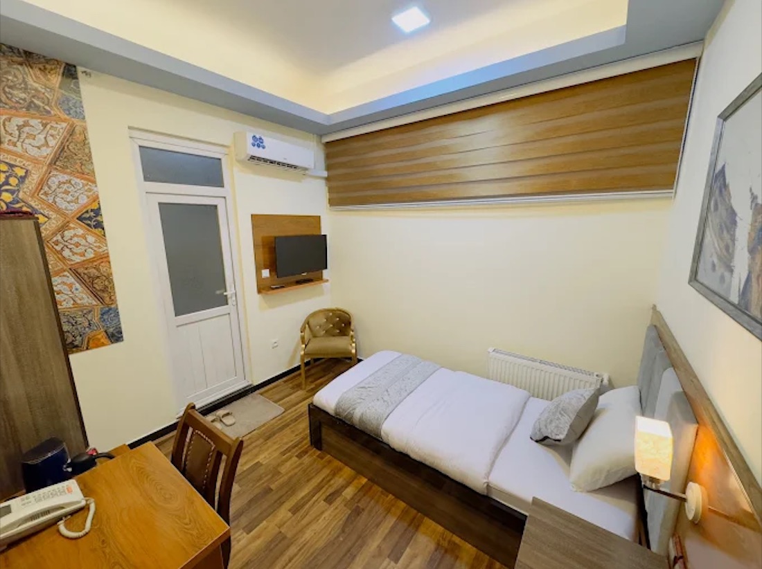 Khyber Hotel room