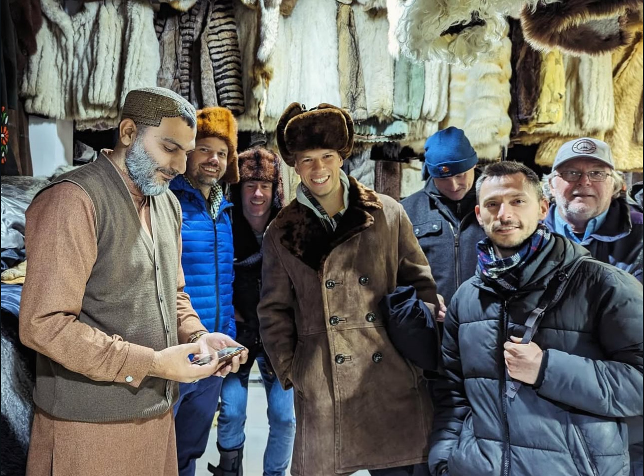 Travelers during a winter market visit in Kabul