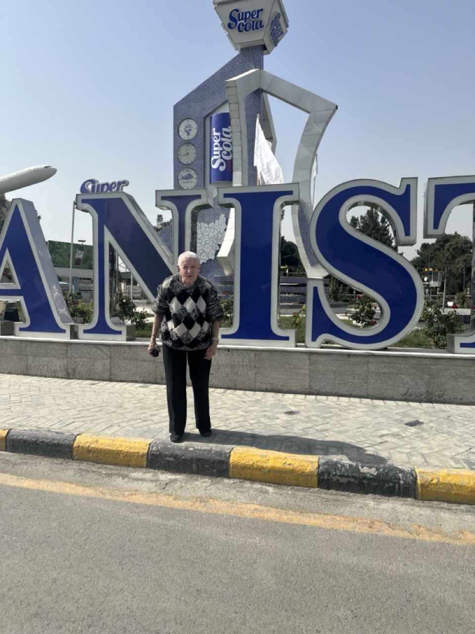 Traveler photographed at the Afghanistan sign in Kabul